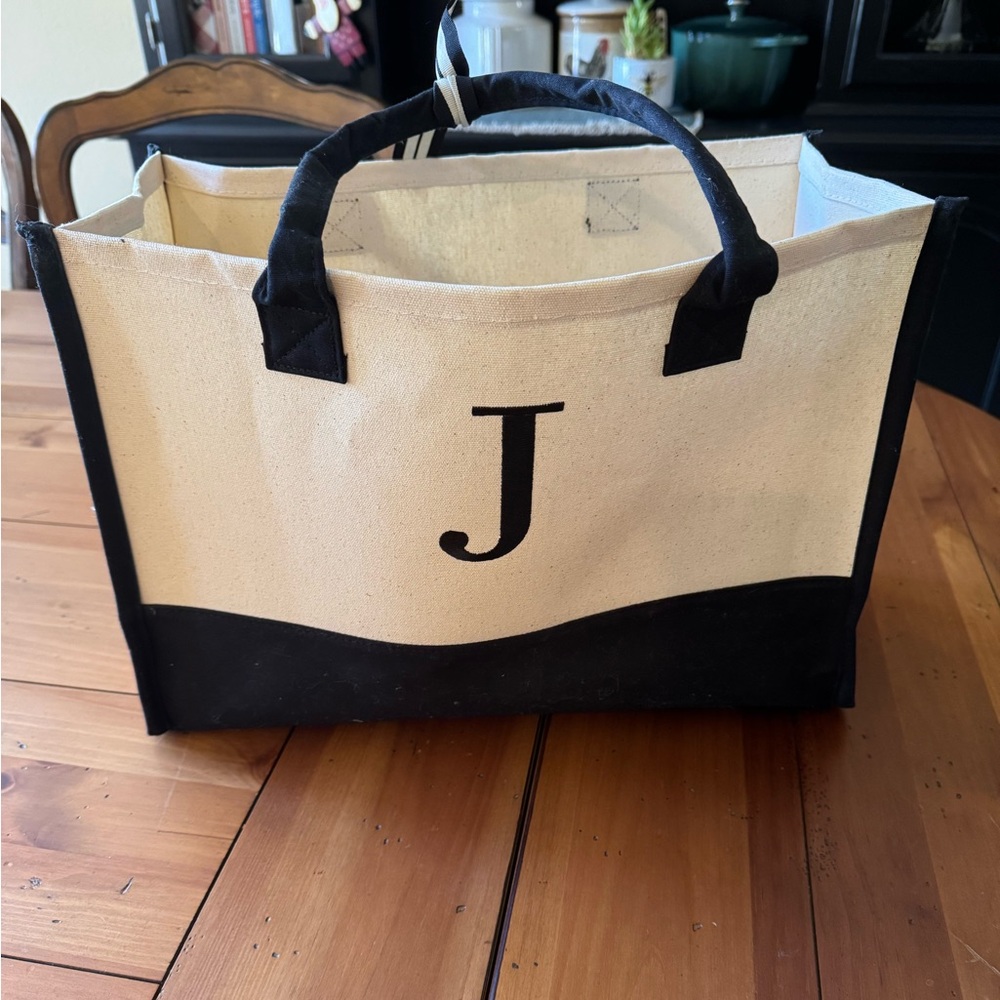 Crème + black J monogram tote bag